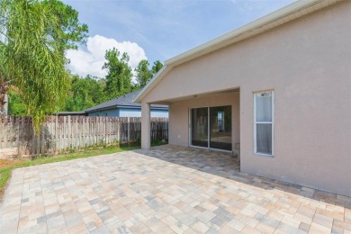 One or more photo(s) has been virtually staged. Tucked away on a on Lexington Oaks Golf Club in Florida - for sale on GolfHomes.com, golf home, golf lot
