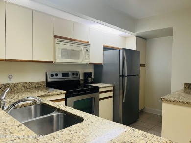 Club Hacienda Condos first floor one bedroom two bath condo - on La Cita Country Club in Florida - for sale on GolfHomes.com, golf home, golf lot