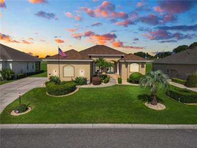 As you step into this luxurious golf course home overlooking the on Huntington Hills Golf and Country Club in Florida - for sale on GolfHomes.com, golf home, golf lot