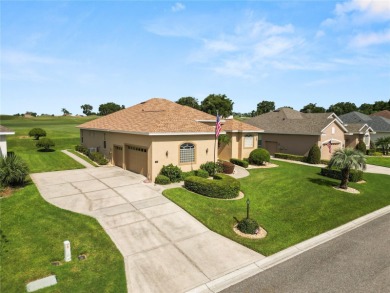 As you step into this luxurious golf course home overlooking the on Huntington Hills Golf and Country Club in Florida - for sale on GolfHomes.com, golf home, golf lot