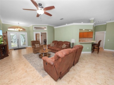 As you step into this luxurious golf course home overlooking the on Huntington Hills Golf and Country Club in Florida - for sale on GolfHomes.com, golf home, golf lot