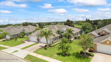 Live the good life in this upscale lakefront villa in Viera on Viera East Golf Club in Florida - for sale on GolfHomes.com, golf home, golf lot