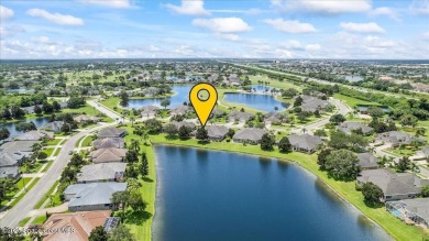 Live the good life in this upscale lakefront villa in Viera on Viera East Golf Club in Florida - for sale on GolfHomes.com, golf home, golf lot