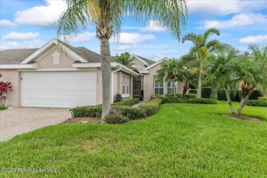 Live the good life in this upscale lakefront villa in Viera on Viera East Golf Club in Florida - for sale on GolfHomes.com, golf home, golf lot
