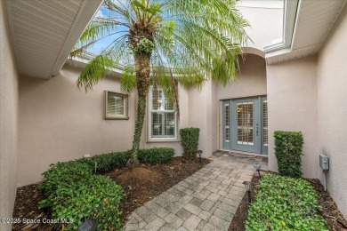 Live the good life in this upscale lakefront villa in Viera on Viera East Golf Club in Florida - for sale on GolfHomes.com, golf home, golf lot