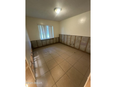 Are you an investor or homebuyer looking for a project? This on Daytona Beach Golf Club in Florida - for sale on GolfHomes.com, golf home, golf lot