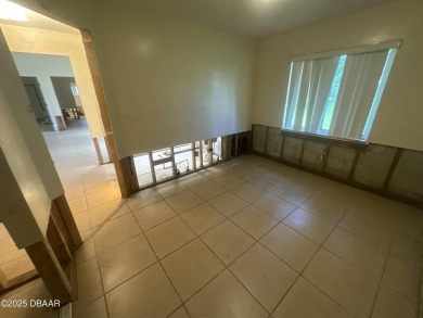 Are you an investor or homebuyer looking for a project? This on Daytona Beach Golf Club in Florida - for sale on GolfHomes.com, golf home, golf lot