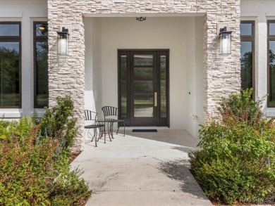 Luxury, efficiency, and elegance converge in this 2022 on Black Diamond Ranch Golf Course in Florida - for sale on GolfHomes.com, golf home, golf lot