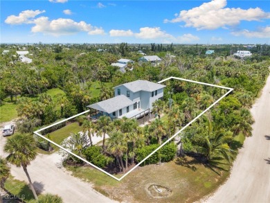 Experience coastal living at its finest in this stunning on The Sanctuary Golf Club in Florida - for sale on GolfHomes.com, golf home, golf lot