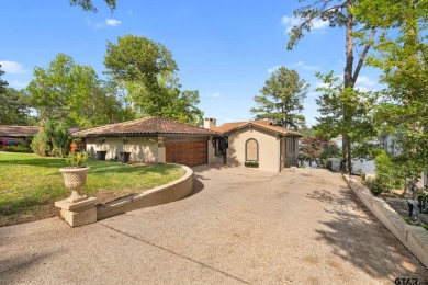 Luxurious waterfront home in sought after Hideaway Lake on Hide-A-Way Lake Golf Course in Texas - for sale on GolfHomes.com, golf home, golf lot