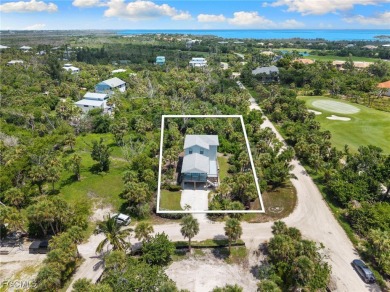 Experience coastal living at its finest in this stunning on The Sanctuary Golf Club in Florida - for sale on GolfHomes.com, golf home, golf lot