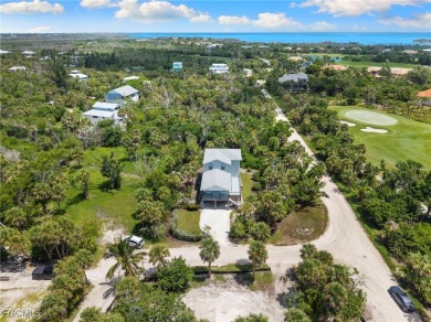Experience coastal living at its finest in this stunning on The Sanctuary Golf Club in Florida - for sale on GolfHomes.com, golf home, golf lot