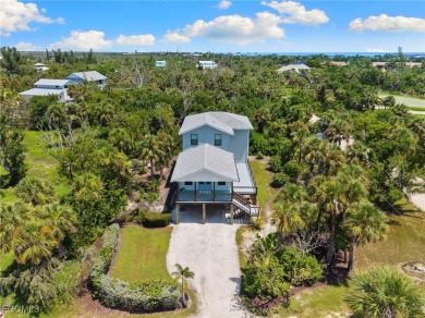 Experience coastal living at its finest in this stunning on The Sanctuary Golf Club in Florida - for sale on GolfHomes.com, golf home, golf lot