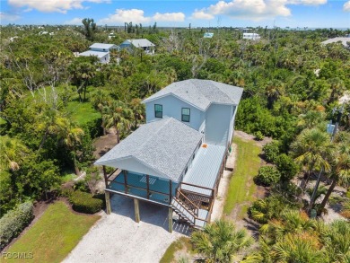 Experience coastal living at its finest in this stunning on The Sanctuary Golf Club in Florida - for sale on GolfHomes.com, golf home, golf lot