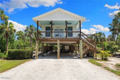 Experience coastal living at its finest in this stunning on The Sanctuary Golf Club in Florida - for sale on GolfHomes.com, golf home, golf lot