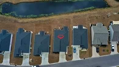 Do you want a 4-bedroom home at a GREAT PRICE, on a tranquil on Ocean Ridge Plantation in North Carolina - for sale on GolfHomes.com, golf home, golf lot