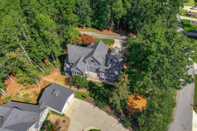 Experience lakefront living at its finest in this beautifully on Tara Golf Club At Savannah Lakes in South Carolina - for sale on GolfHomes.com, golf home, golf lot