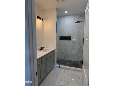 Stunning modern new construction in the gated lake community of on River Golf and Country Club at Lake Royale in North Carolina - for sale on GolfHomes.com, golf home, golf lot