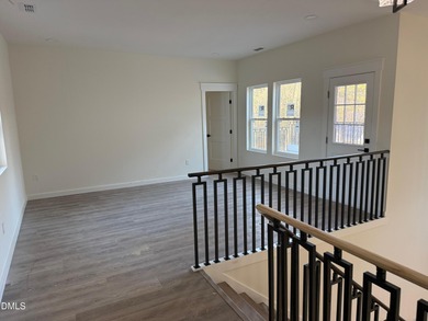 Stunning modern new construction in the gated lake community of on River Golf and Country Club at Lake Royale in North Carolina - for sale on GolfHomes.com, golf home, golf lot