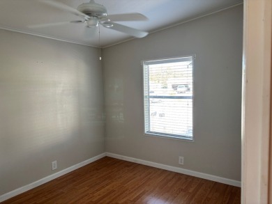 Welcome to this charming 3 bedroom, 2 bath Palm Harbor home on St. Johns Golf Club in Florida - for sale on GolfHomes.com, golf home, golf lot