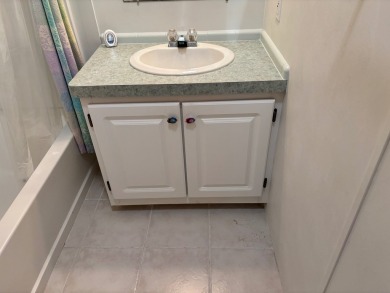 Welcome to this charming 3 bedroom, 2 bath Palm Harbor home on St. Johns Golf Club in Florida - for sale on GolfHomes.com, golf home, golf lot