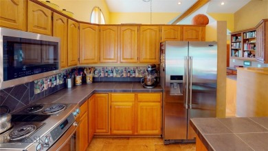 Single-level living at Riverside! This impeccably maintained on Riverside Country Club in Montana - for sale on GolfHomes.com, golf home, golf lot