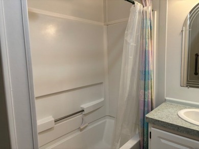 Welcome to this charming 3 bedroom, 2 bath Palm Harbor home on St. Johns Golf Club in Florida - for sale on GolfHomes.com, golf home, golf lot