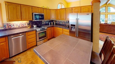 Single-level living at Riverside! This impeccably maintained on Riverside Country Club in Montana - for sale on GolfHomes.com, golf home, golf lot