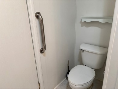 Welcome to this charming 3 bedroom, 2 bath Palm Harbor home on St. Johns Golf Club in Florida - for sale on GolfHomes.com, golf home, golf lot