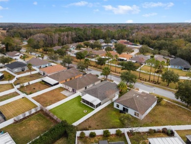 Welcome to 5809 War Admiral Drive, nestled in the highly on Lexington Oaks Golf Club in Florida - for sale on GolfHomes.com, golf home, golf lot