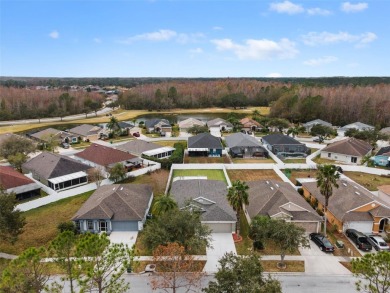 Welcome to 5809 War Admiral Drive, nestled in the highly on Lexington Oaks Golf Club in Florida - for sale on GolfHomes.com, golf home, golf lot