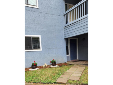 Ground level condo overlooking pool and fairwaypletely painted on Rockport Country Club in Texas - for sale on GolfHomes.com, golf home, golf lot