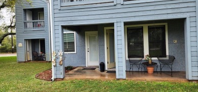 Ground level condo overlooking pool and fairwaypletely painted on Rockport Country Club in Texas - for sale on GolfHomes.com, golf home, golf lot