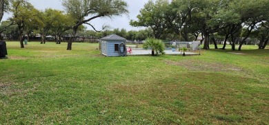 Ground level condo overlooking pool and fairwaypletely painted on Rockport Country Club in Texas - for sale on GolfHomes.com, golf home, golf lot