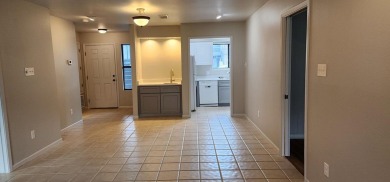 Ground level condo overlooking pool and fairwaypletely painted on Rockport Country Club in Texas - for sale on GolfHomes.com, golf home, golf lot