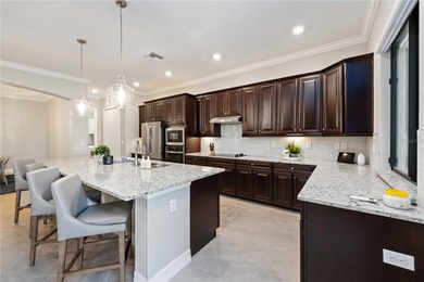 Welcome to 25064 Spartina Drive, an executive home that is on Sarasota National Golf Club in Florida - for sale on GolfHomes.com, golf home, golf lot