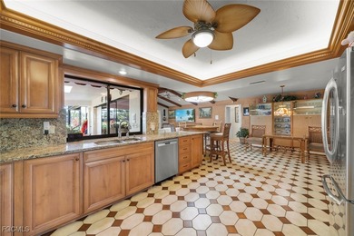 Over 3,200 sq ft of living in this 4 bedroom, 3 bath on Fiddlesticks Country Club in Florida - for sale on GolfHomes.com, golf home, golf lot