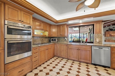 Over 3,200 sq ft of living in this 4 bedroom, 3 bath on Fiddlesticks Country Club in Florida - for sale on GolfHomes.com, golf home, golf lot