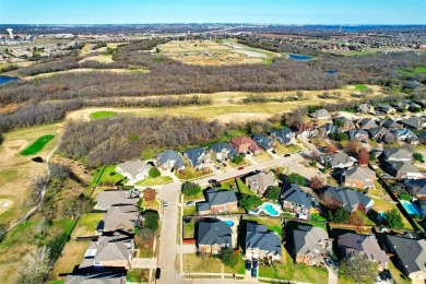 Welcome to 4201 Iron Ln, a stunning 4-bedroom, 3.5-bath home on Mansfield National Golf Club in Texas - for sale on GolfHomes.com, golf home, golf lot