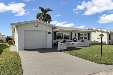 This beautiful Edgewood 2Br/2Ba model with a full Florida room on Leisureville Community Golf Course in Florida - for sale on GolfHomes.com, golf home, golf lot