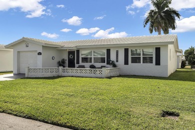 This beautiful Edgewood 2Br/2Ba model with a full Florida room on Leisureville Community Golf Course in Florida - for sale on GolfHomes.com, golf home, golf lot