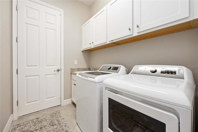 Welcome to 25064 Spartina Drive, an executive home that is on Sarasota National Golf Club in Florida - for sale on GolfHomes.com, golf home, golf lot