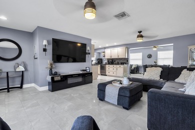 This beautiful Edgewood 2Br/2Ba model with a full Florida room on Leisureville Community Golf Course in Florida - for sale on GolfHomes.com, golf home, golf lot