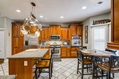 Nestled within a prestigious gated golf community, this on Brunswick Plantation and Golf Resorts in North Carolina - for sale on GolfHomes.com, golf home, golf lot