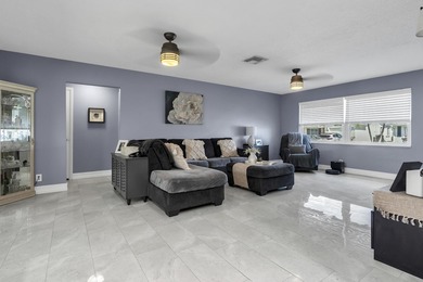 This beautiful Edgewood 2Br/2Ba model with a full Florida room on Leisureville Community Golf Course in Florida - for sale on GolfHomes.com, golf home, golf lot