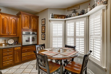 Nestled within a prestigious gated golf community, this on Brunswick Plantation and Golf Resorts in North Carolina - for sale on GolfHomes.com, golf home, golf lot