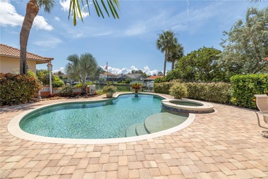 WELCOME TO PARADISE SAYS THIS WATERFRONT BEAUTY IN THE GATED & on Isla Del Sol Yacht and Country Club in Florida - for sale on GolfHomes.com, golf home, golf lot