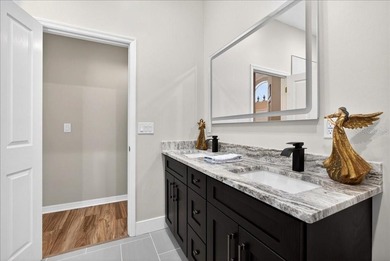 Refined Florida living awaits in this beautifully maintained on The Grand Club - Pine Lakes Course in Florida - for sale on GolfHomes.com, golf home, golf lot