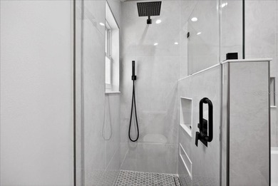 Refined Florida living awaits in this beautifully maintained on The Grand Club - Pine Lakes Course in Florida - for sale on GolfHomes.com, golf home, golf lot