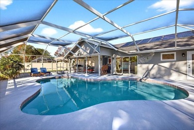 Refined Florida living awaits in this beautifully maintained on The Grand Club - Pine Lakes Course in Florida - for sale on GolfHomes.com, golf home, golf lot